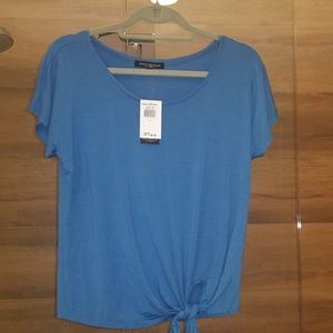 Blue tee shirt with tie front at waist